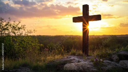 A cross on a hill with flowers, presented on a nature background.