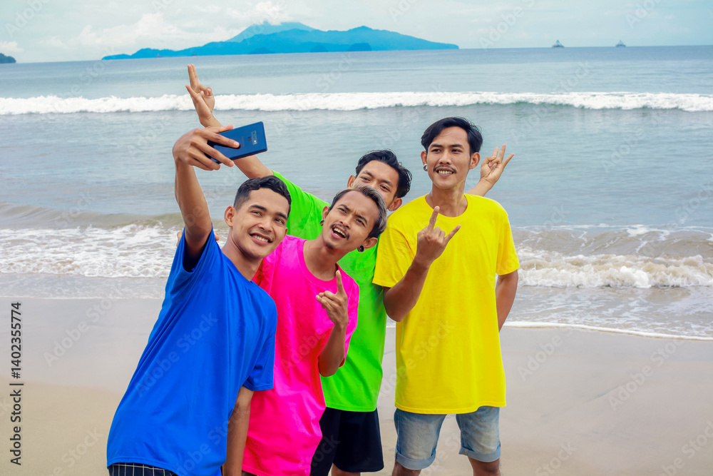 Four Happy Friends Taking a Selfie on a Sunny Tropical Beach Four Happy Friends Taking a Selfie on a Sunny Tropical Beach