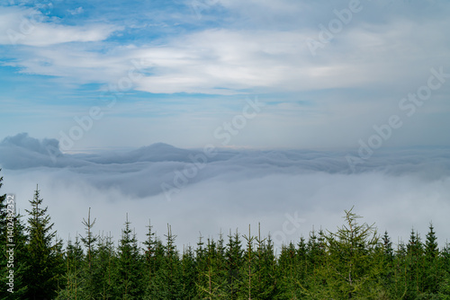 Misty Tatra Mountain Forest Panorama with Partly Cloudy Skies