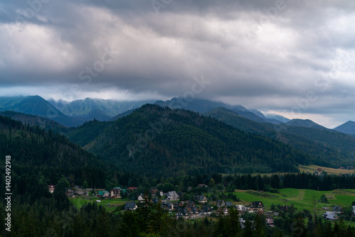 Fototapeta Naklejka Na Ścianę i Meble -  Zakopane's Alpine View with Rolling Clouds - Summer