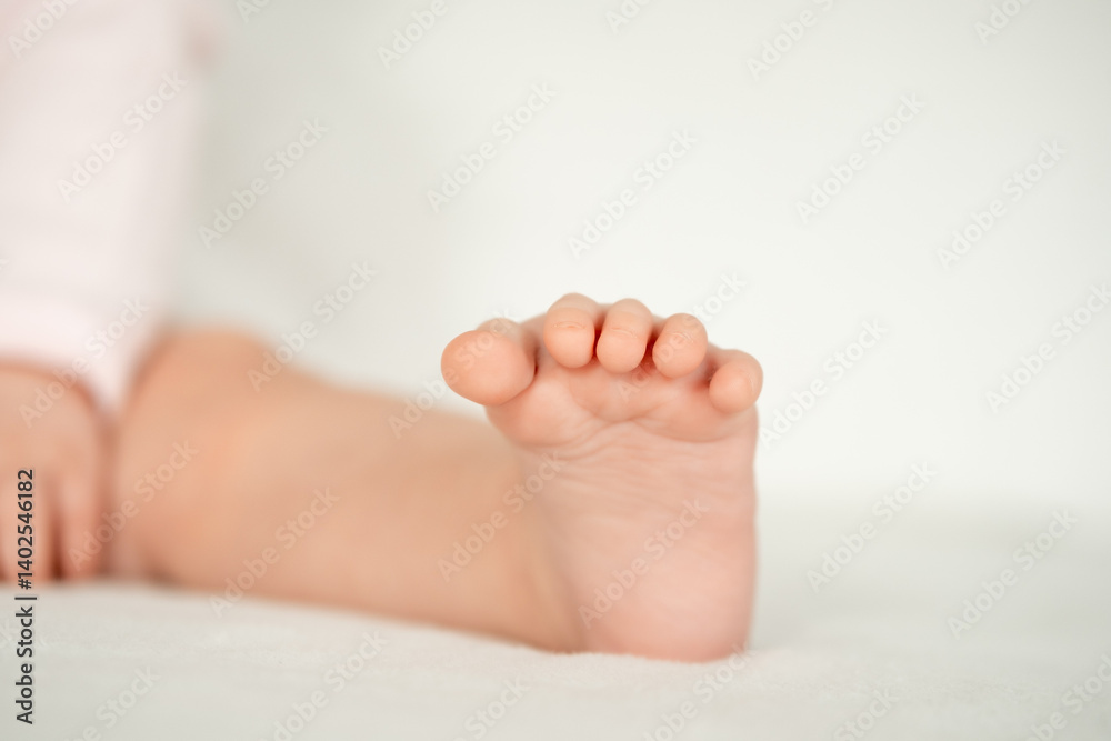 a baby's foot on a white background, a small pink heel of a baby a baby's foot on a white background, a small pink heel of a baby