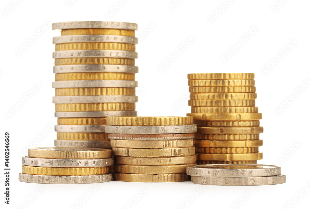 Stacks of different coins isolated on white Stacks of different coins isolated on white