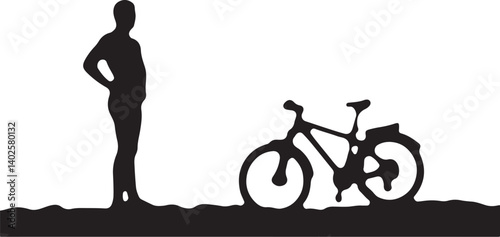silhouette of a man with a bicycle