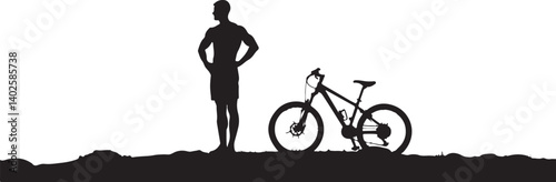 silhouette of a man with a bicycle