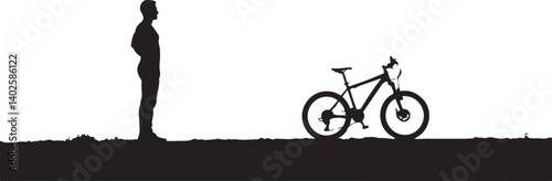 silhouette of a man with a bicycle