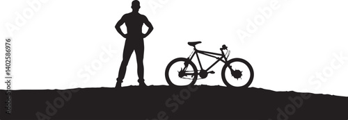 silhouette of a man with a bicycle