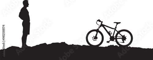 silhouette of a man with a bicycle