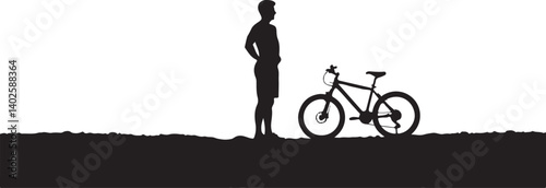 silhouette of a man with a bicycle