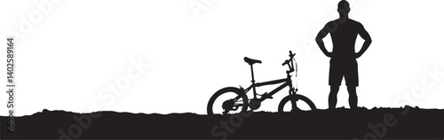 silhouette of a man with a bicycle