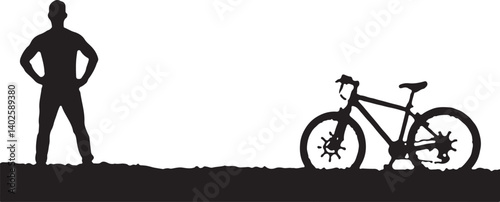silhouette of a man with a bicycle