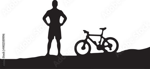 silhouette of a man with a bicycle