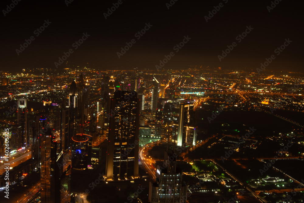 Fototapeta premium Vibrant Night City Skyline Aerial View