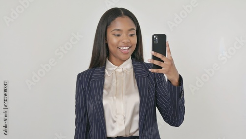 Obraz na płótnie Woman in business attire with cell phone w salonie
