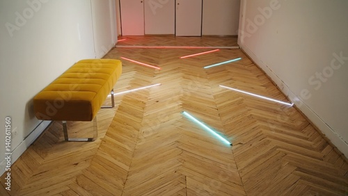 Elegant, modern interior with geometric light patterns on the floor and wall decorations. Includes a sleek bench.