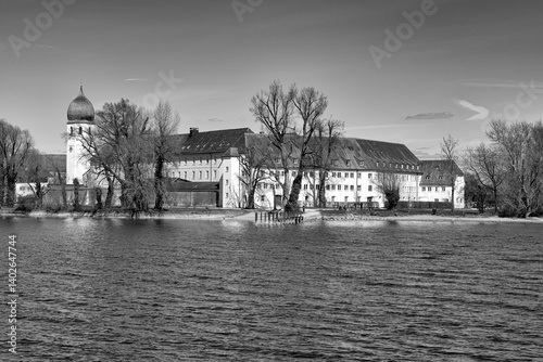 Seeseitige Panoramansicht des Klosters mit dem Campanile ( Glockenturm ) auf der Fraueninsel des Chiemsees - Frauenwörth  ist eine Abtei der Benediktinerinnen photo
