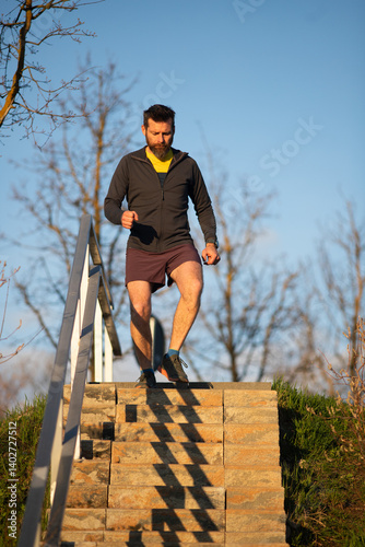 Obraz na płótnie fit healthy man running outdoors w salonie