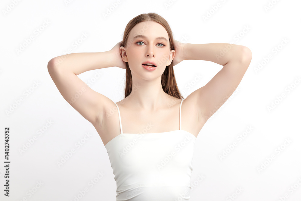 Beautiful Young woman Raises her hands to Showcase clean and hygienic underarms Against a white background, Smooth armpit cleanliness and protection concept Beautiful Young woman Raises her hands to Showcase clean and hygienic underarms Against a white background, Smooth armpit cleanliness and protection concept