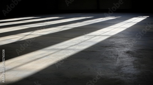 Wallpaper Mural Sunlight streams through a series of rectangular windows, casting long shadows on the concrete floor. Torontodigital.ca