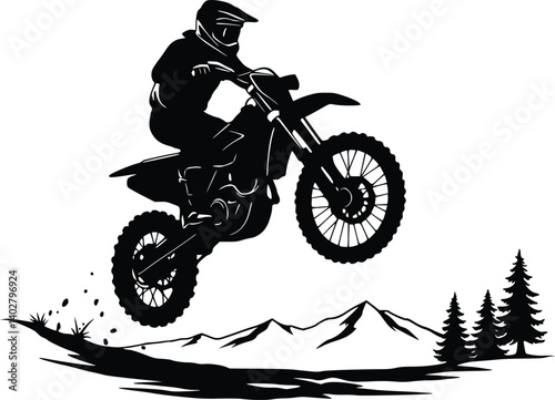 Silhouette of a dirt bike rider in mid-air jump over rugged terrain, symbolizing extreme sports