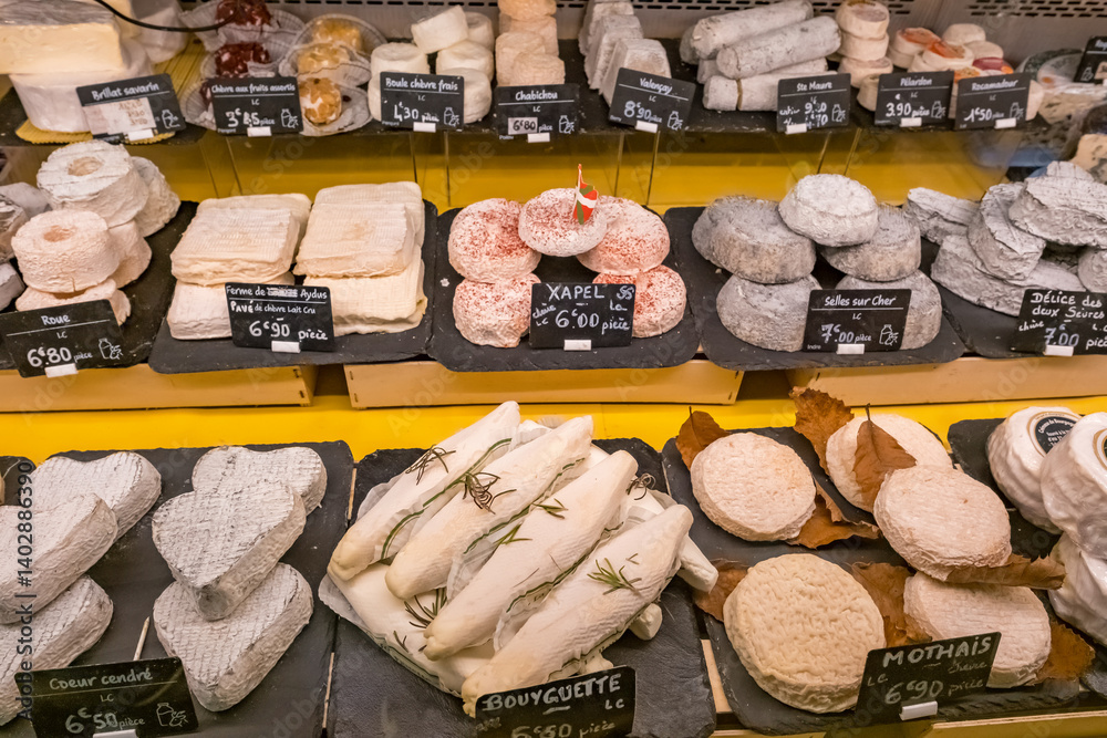 Wide selection of cheese at Halles de Biarritz market, France