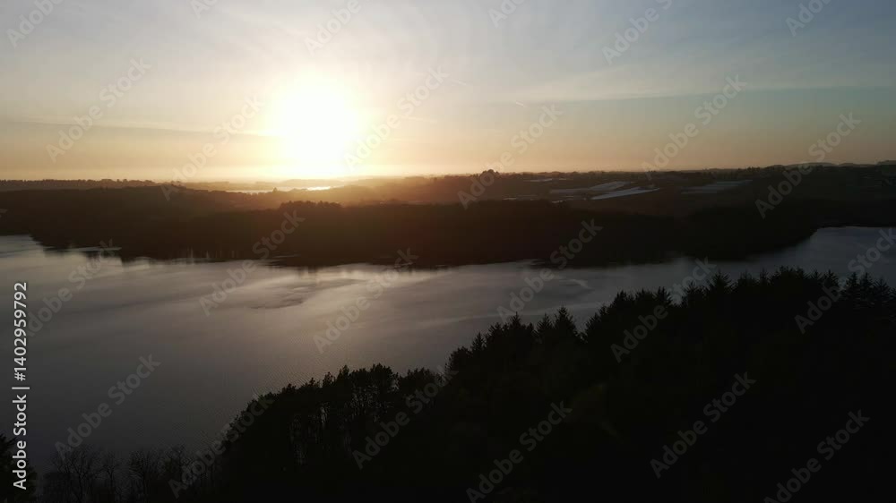 Aerial Drone Shot Over Stokkavannet Lake At Dawn With Calm Waters And Soft Morning Light Aerial Drone Shot Over Stokkavannet Lake At Dawn With Calm Waters And Soft Morning Light