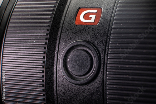 close-up photo of a digital camera markings on the lens focal length camera details