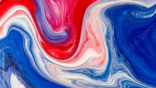 Dynamic abstract fluid art featuring swirling red, white and blue paint creating mesmerizing marble patterns on smooth surface.