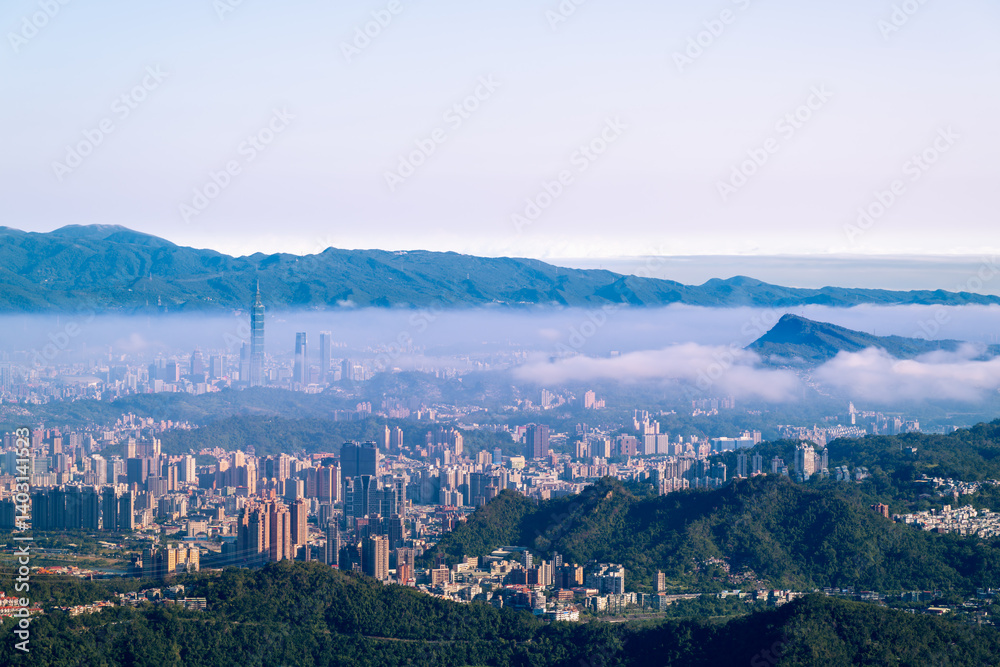 As dawn breaks, white clouds waltz gracefully over Taipei's skyline. Captured from Lion's Head Mountain, this scene evokes a sense of tranquility and harmony with nature. As dawn breaks, white clouds waltz gracefully over Taipei's skyline. Captured from Lion's Head Mountain, this scene evokes a sense of tranquility and harmony with nature.