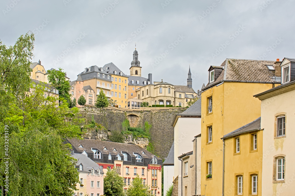 Fototapeta premium Old city walls of Luxembourg and Saint Michael`s Church in Luxembourg city