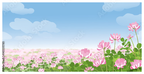 青空のもと一面に広がるれんげ畑 遠近感のある背景イラスト