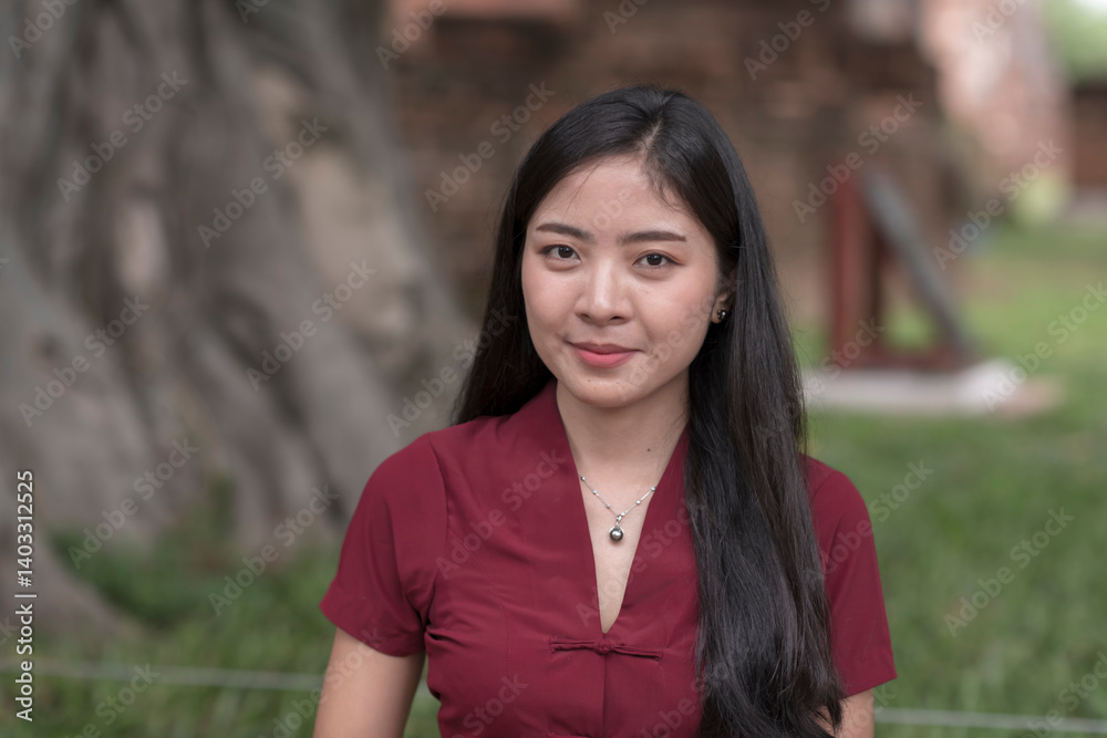 Portrait young woman in Thai traditional clothes Ayutthaya, Thailand
Portrait young woman in Thai traditional clothes Ayutthaya, Thailand