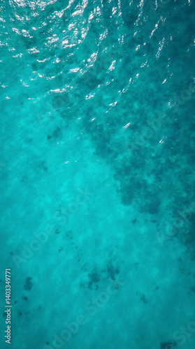 Wallpaper Mural Overhead Drone View Of Calm Turquoise Water Surface With Gentle Ripples Creating Natural Abstract Pattern
 Torontodigital.ca