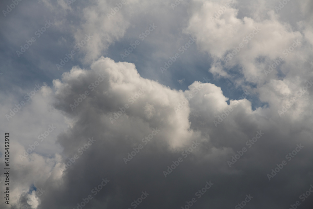 Blue sky with fluffy white close up clouds. Blue sky with fluffy white close up clouds.