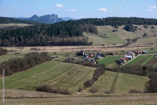 Obraz na płótnie Rural scenery of buildings of village Kacwin among fields, Lesser Poland, Poland w salonie