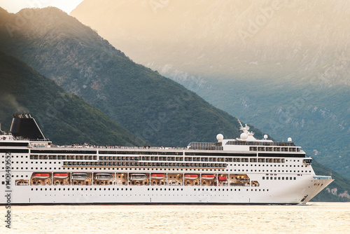 Majestic mountains and cruise at sunset