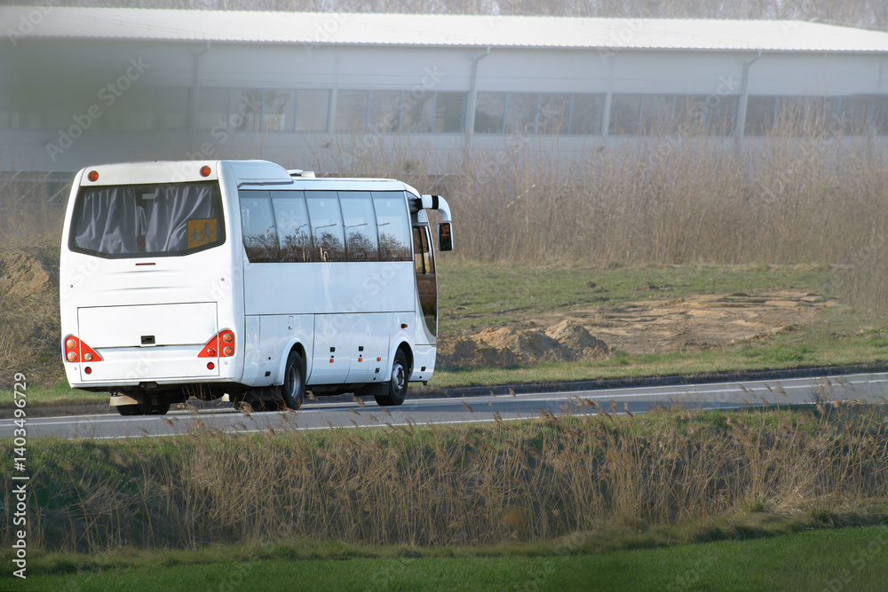 Modern bus moving on smooth paved road