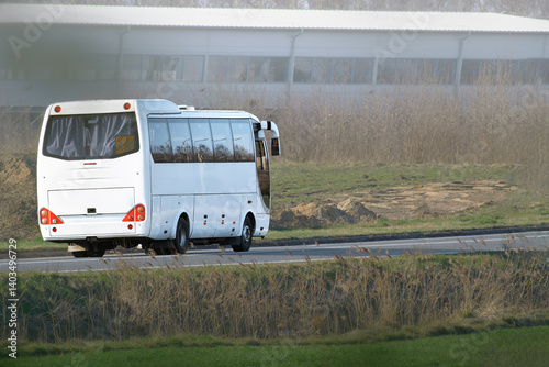 Obraz na płótnie Modern bus moving on smooth paved road w salonie