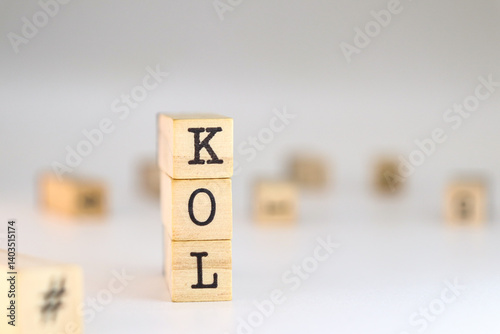 Wallpaper Mural Key Opinion Leader acronym. word KOL written on wooden cubes isolated on white background with copy space. Concept of concept of digital expert, influencer Torontodigital.ca