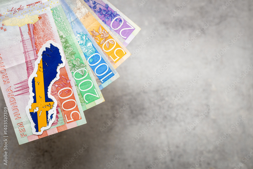 Sweden money and national emblem, Gray background, copy space, flat lay, Financial background, swedish kroner banknotes, close up