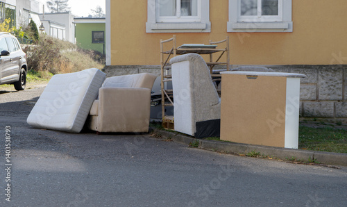 Bilde på lerret Pile of bulky waste with furniture at the side of the road