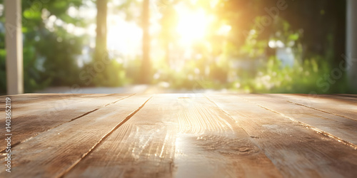 Obraz na płótnie Warm Sunlight on Brown Wooden Planks Table Top with Blurred Green Foliage in Background Natural Wood Grain and Texture Background w salonie