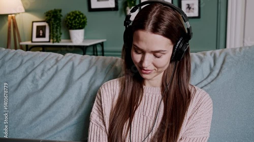 The Woman Enjoying Music
