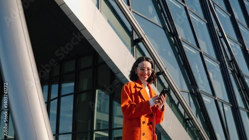 The Woman with Smartphone Outdoors