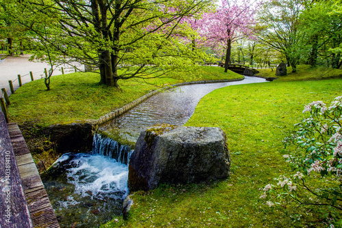 Bild auf Leinwand Wooden Torii gate and earthen garden path in the Japanese Garden in Hasselt