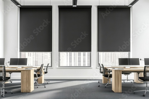 Modern open-plan office space with black roller blinds and light wooden furniture.  Windows offer city views