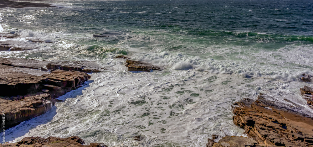 Atlantic Ocean Rocky Coastal Shoreline with Waves Crashing on Rocks