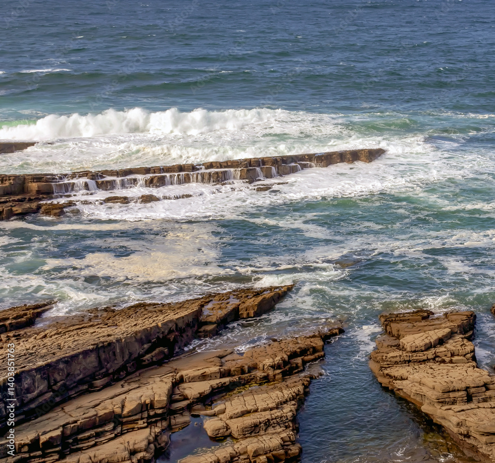 Atlantic Ocean Rocky Coastal Shoreline with Waves Crashing on Rocks