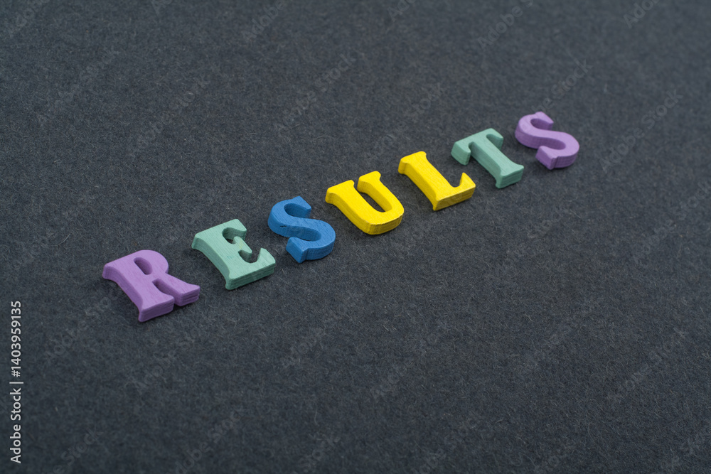 RESULTS word on black board background composed from colorful abc alphabet block wooden letters, copy space for ad text. Learning english concept. RESULTS word on black board background composed from colorful abc alphabet block wooden letters, copy space for ad text. Learning english concept.