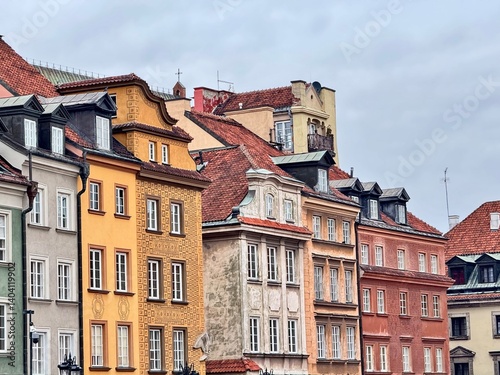 view of colorful buildings in Warsaw's Old Town on a cloudy winter day
