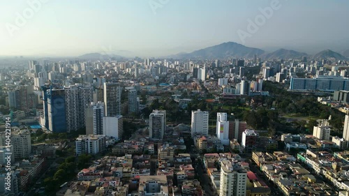 The bustling and traffic-filled city of Lima seen from a drone during the autumn season.